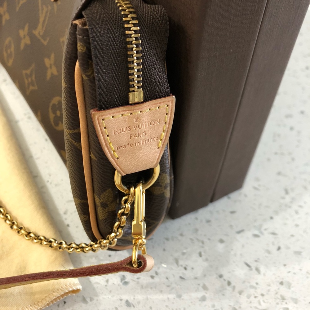 SOLD!! Authentic Louis Vuitton Eva crossbody - Picture 4 of 8